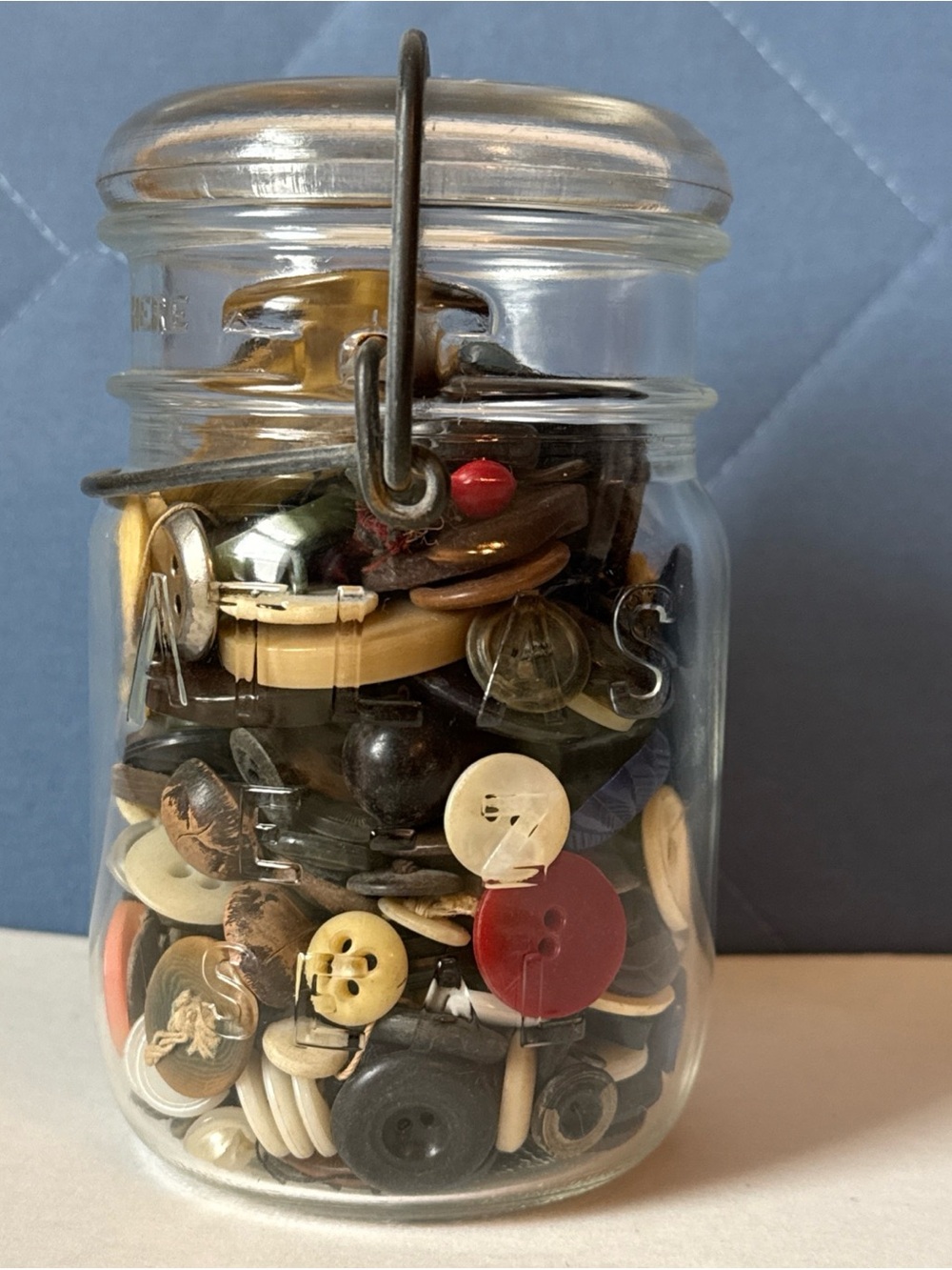 4.5” tall VTG glass Atlas wire close jar w/vintage buttons